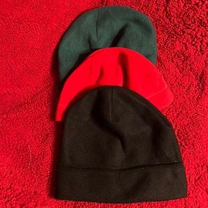 Women’s Kelly green hat. One red beanie. One black beanie. Sold together.